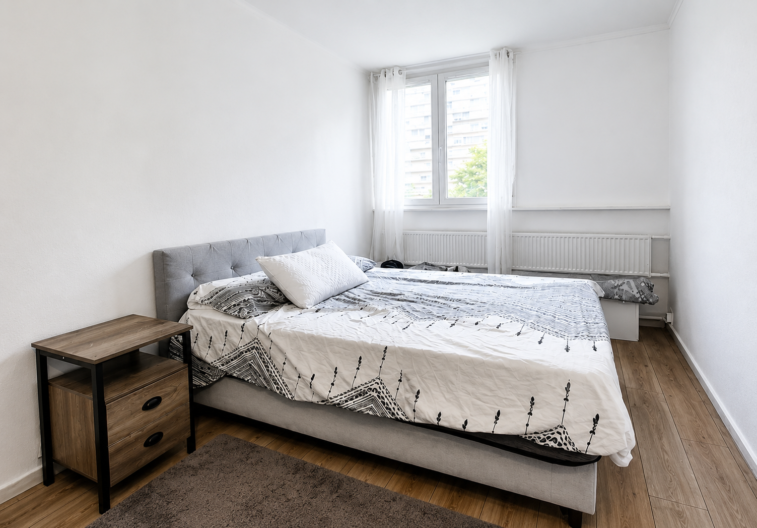 Chambre principale lumineuse du T3 — Saint-Étienne Fauriel